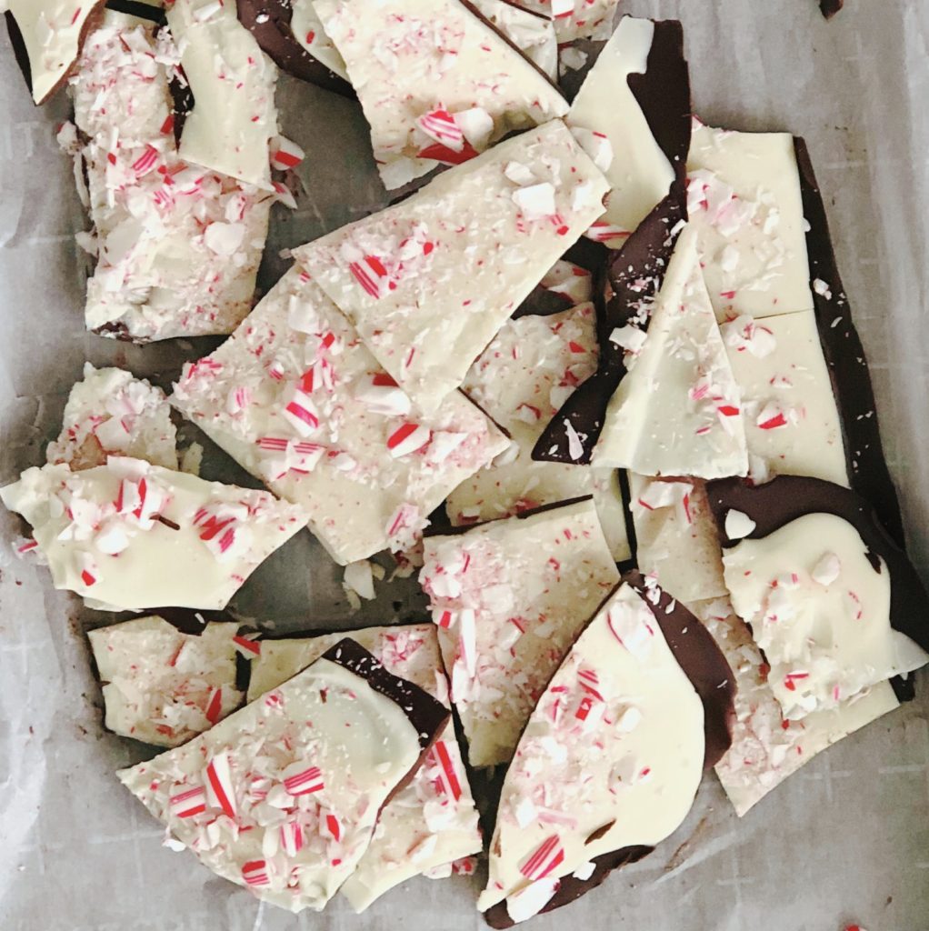 Peppermint Bark piled on parchment paper.