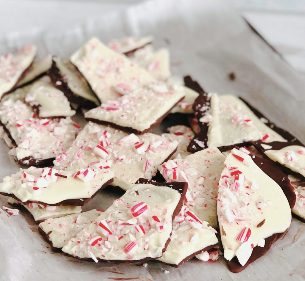 Peppermint Bark piled on parchment paper.