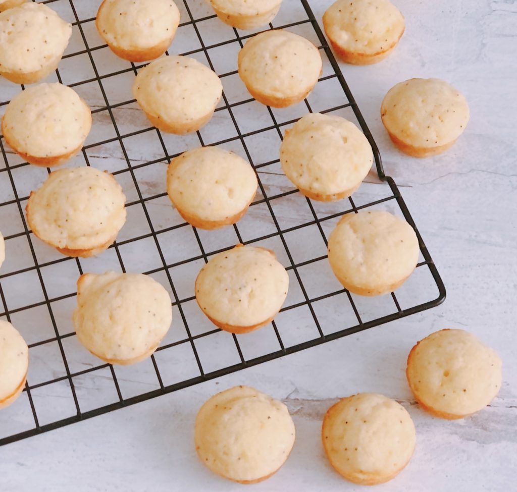 Mini Lemon Ricotta Muffins on a wire rack