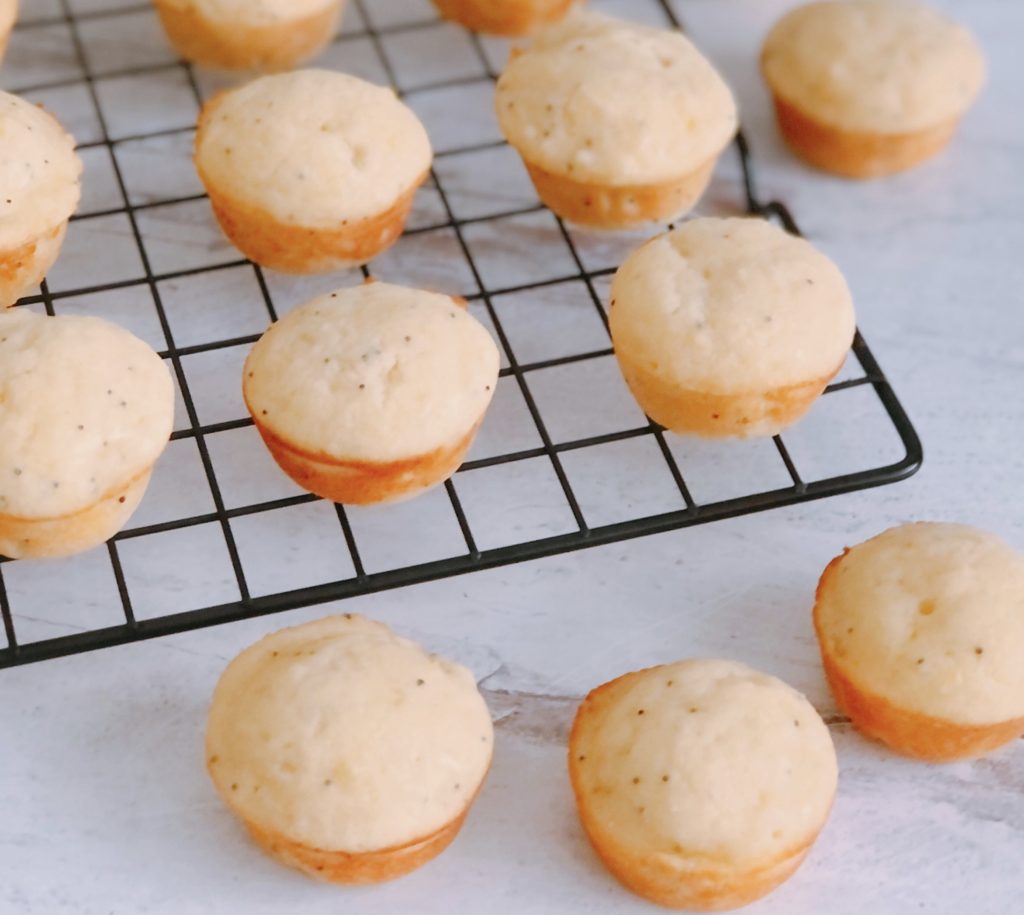 Mini Lemon Ricotta Muffins on a wire rack